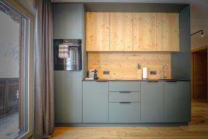 Kuchyň nebo kuchyňský kout v ubytování WOLF Apartments Padaun
