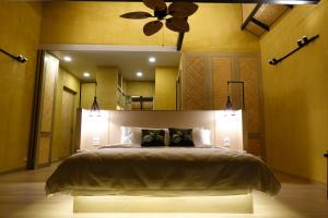 Postel nebo postele na pokoji v ubytování Kavin Residence