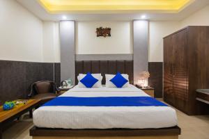 Postel nebo postele na pokoji v ubytování Hotel Mahajan International, Delhi Airport