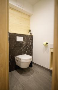 Koupelna v ubytování WOLF Apartments Padaun