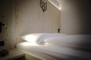 Postel nebo postele na pokoji v ubytování WOLF Apartments Padaun