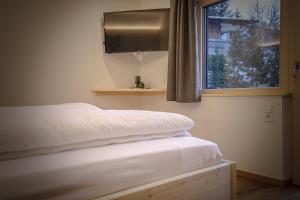 Postel nebo postele na pokoji v ubytování WOLF Apartments Padaun