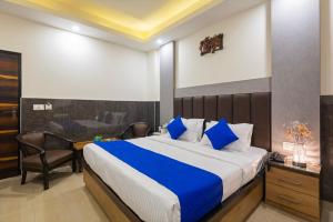 Postel nebo postele na pokoji v ubytování Hotel Mahajan International, Delhi Airport