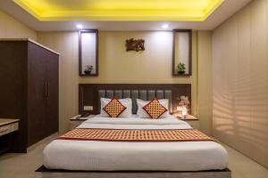 Postel nebo postele na pokoji v ubytování Hotel Mahajan International, Delhi Airport