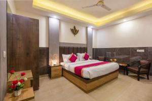 Postel nebo postele na pokoji v ubytování Hotel Mahajan International, Delhi Airport