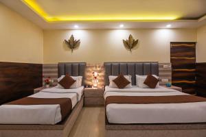 Postel nebo postele na pokoji v ubytování Hotel Mahajan International, Delhi Airport