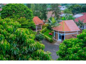 an aerial view of a house in a forest at Planete Hotel in Rubavu