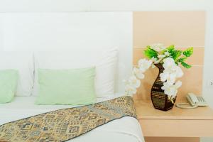 Letto o letti in una camera di The Infinity Suite Chiangrai