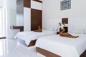 Letto o letti in una camera di The Infinity Suite Chiangrai