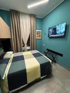 TV a/nebo společenská místnost v ubytování B&B Parma Centro