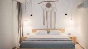 Llit o llits en una habitació de The Bay View Hotel Kalkan