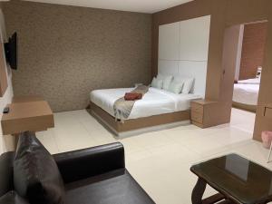 Letto o letti in una camera di The Infinity Suite Chiangrai