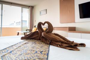 Letto o letti in una camera di The Infinity Suite Chiangrai