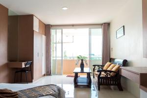 Area soggiorno di The Infinity Suite Chiangrai