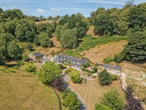 an aerial view of a house on a hill at 1 bed property in Alton 62237 in Alton
