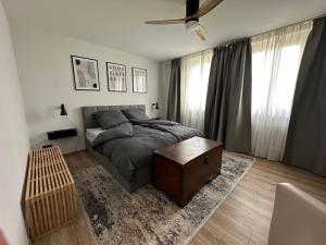 Posezení v ubytování CityAppartLuxe am Hofgarten - zwischen Uni und Stadt-Zentrum + 24 fotografií