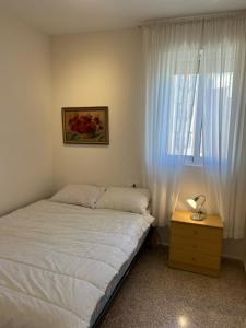 Łóżko lub łóżka w pokoju w obiekcie Sainvi 7 7D