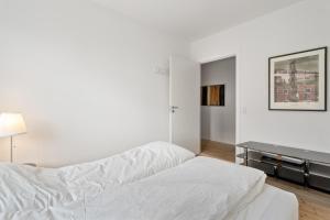 Säng eller sängar i ett rum på Come Stay Charming 2 BR - Near Frederiksberg