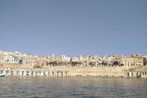 a view of a city from the water at Charming Senglea Studio in Senglea +4 photos