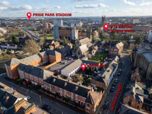 an aerial view of a city with buildings at Spacious Luxury 2 Bedroom House in Derby