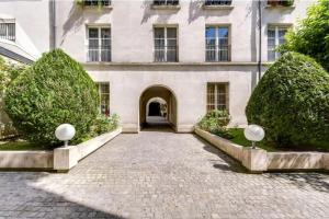 Vonkajšia záhrada v ubytovaní Modern and huge 3BD for 10 guests in Le Marais!