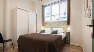 Posteľ alebo postele v izbe v ubytovaní Panthéon Modern and exclusive 3BD