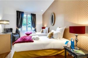 Posteľ alebo postele v izbe v ubytovaní Huge and bright 4BD for 10 guests Sacre-Coeur