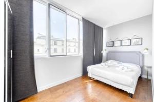 Posteľ alebo postele v izbe v ubytovaní Huge and bright 4BD for 10 guests Sacre-Coeur