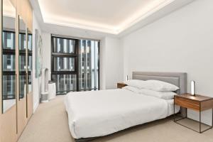 Letto o letti in una camera di Beautiful 2-Bed Unit In Incredible Location