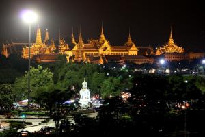 a view of a city at night at Thai Cozy House in Bangkok