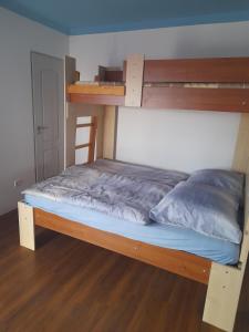 A bed or beds in a room at Ferienhaus Judit