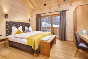 Postel nebo postele na pokoji v ubytování Chalet Stuibenfall Niederthai