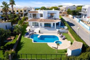 an aerial view of a villa with a swimming pool at Seafront View next to the famous “Benagil Caves” in Benagil