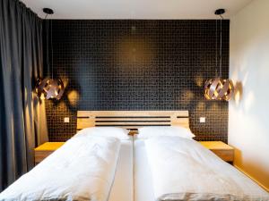 Ένα ή περισσότερα κρεβάτια σε δωμάτιο στο Domizil am Gohrisch