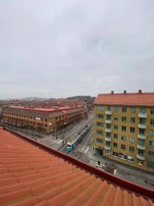 a view of a city with buildings and a street at Cozy And Luxury Private Terrace Apartment in Gothenburg