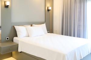 Postel nebo postele na pokoji v ubytování Akdeniz Yaşam Otel