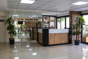 a lobby with a reception desk in a building at Akdeniz Yaşam Otel in Silifke