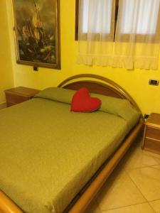 Postel nebo postele na pokoji v ubytování Casatragliulivi