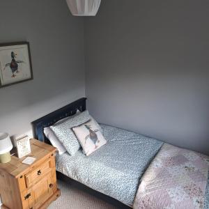 Voodi või voodid majutusasutuse Red Gate Cottage toas