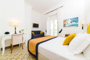 Postel nebo postele na pokoji v ubytování Amalfi Luxury House