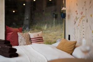 Postel nebo postele na pokoji v ubytování Tiny House Manka