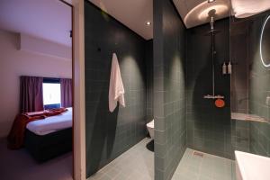 Kúpeľňa v ubytovaní Hotel Unplugged