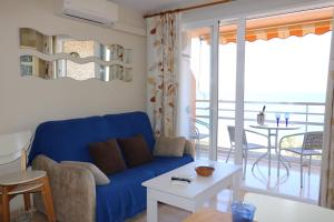 Posezení v ubytování apartamento 5B MAR 2 1 dormitorio
