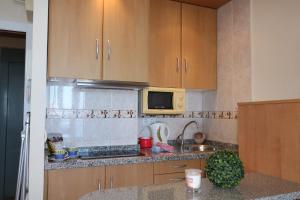 Kuchyň nebo kuchyňský kout v ubytování apartamento 5B MAR 2 1 dormitorio