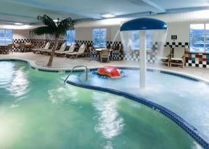 a large swimming pool with a ball in the middle at Hampton Inn & Suites Boise-Downtown in Boise