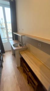 a room with a counter with a desk at Hôtel Lyonnais in Nice