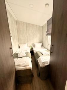 Postel nebo postele na pokoji v ubytování Sunny Hotel Straubing