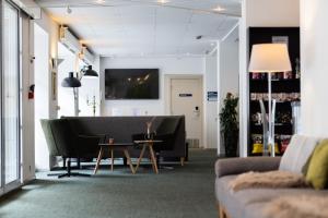 Uma área de estar em Milling Hotel Gestus