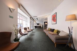 Uma área de estar em Milling Hotel Gestus