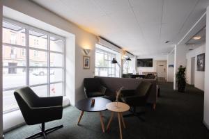 Uma área de estar em Milling Hotel Gestus
